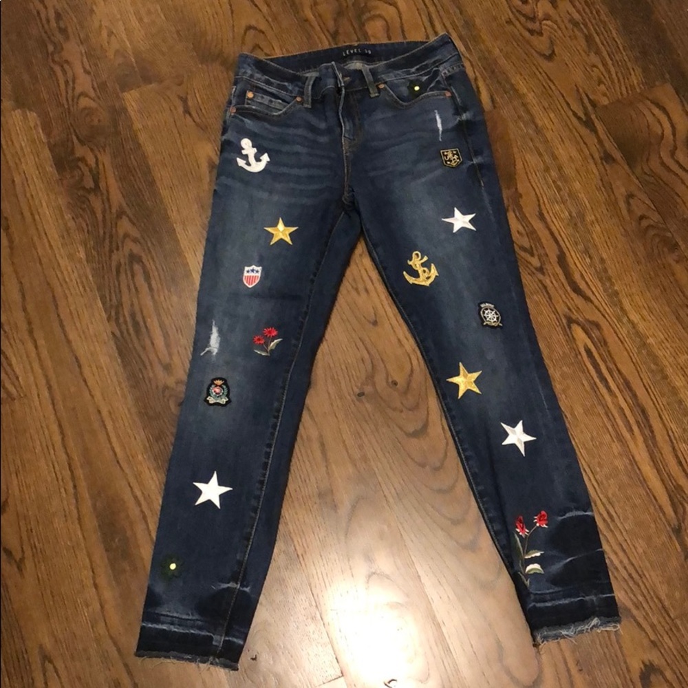 Super cute jeans with stitched on patches!